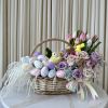 Celebrate the joy of Easter with this delightful basket filled with springtime