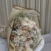 This delicate bouquet features 50 roses with soft baby's breath accents. The