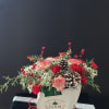 A fun and festive arrangement that doubles as holiday decor!