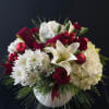 Winter spirit filled arrangement with cushion mums, carnations, mini carnations, lily, hydrangea