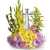 Yellow and purple floral arrangement with a silver ribbon centerpiece