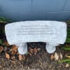 Memorial stone bench with an engraved sympathy verse