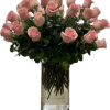 Pink roses arranged in a clear glass vase