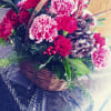 This bouquet takes you to a winter wonderland with it's 2toned carnations