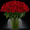 Red roses in a round vase