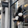 An exquisite black and gold display. The arrangement
features an elegant and dark