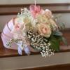 Pink and white rose bouquet with baby's breath and ribbon