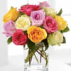 Colorful rose bouquet in a clear glass vase