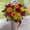 Birthday bouquet of roses, carnations, and mums in a decorated mug