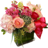 An arrangement with pink and red rose arranged with assorted flowers to