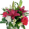 A modern arrangement of lilies mixed with other florals to accent a