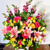 Grace in Bloom  is a tall arrangement that radiates elegance and