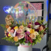 Mixed bouquet in a white hatbox with a birthday balloon