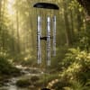 This wind chime is 44&rdquo; inches long and reads and In memory