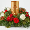 Holiday centerpiece with red and white roses around a gold candle holder