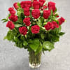 Bouquet of red roses in a clear glass vase