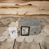 Gray memorial keepsake box with a small photo frame and "Forever Loved" text