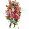Tall standing floral spray with pink lilies, roses, and gerbera daisies