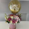 Birthday bouquet with pink and white roses under a gold balloon