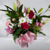 Celebrate Mother's Day with these seasonal bouquet of resh roses, lilies, and