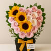 Un coraz&oacute;n floral suave y encantador, dise&ntilde;ado con rosas rosadas y crema