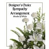 White sympathy arrangement with lilies and carnations