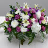 Bouquet of pink roses, white lilies, and white chrysanthemums