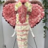 Elephant-shaped floral arrangement in pink and white carnations
