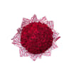 Large bouquet of red roses wrapped in patterned paper