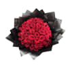 Bouquet of red roses wrapped in black paper