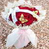 Red rose bouquet with white ribbon, butterflies, and a crown topper