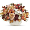 Autumn floral arrangement in a white pumpkin vase with roses and calla lilies
