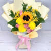 Bouquet of yellow sunflowers, pink roses, and yellow mums wrapped in cream paper