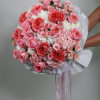 Large pink and white rose bouquet wrapped in white paper