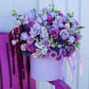 The Lavender Dream Arrangement is a luxurious symphony of lilac, mauve, and