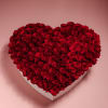 Heart-shaped box filled with red roses