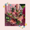 A perfect accessory for prom! Designed for effortless elegance, this bouquet features