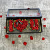 Buyer will receive a box with red roses 