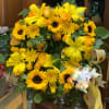 This beautiful all yellow memorial wreath wiill warm the hearts of everyone