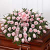 Pink roses pink wax flowers and greens 