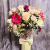 Beautiful custom arrangement full of variety and blush pink to celebrate moment