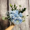 Beautiful baby blue bouquet with varieties lovely flowers 