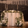 white roses, baby breath, white Lilies and greenery.  This order come
