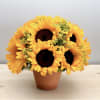 Sunflower bouquet in a brown pot