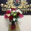 Beautiful floral arrangement that has a variety of flores to make that