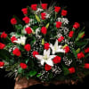 Large bouquet of red roses and white lilies with baby's breath
