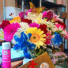 Bright mixed bouquet with a Ferrero Rocher box in front