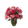 Pink mixed flower bouquet in a glass vase