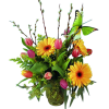 Bright mixed bouquet with yellow gerbera daisies and pink tulips in a glass vase