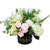 Bring the gardens indoors with a lush assortment of creams, whites and